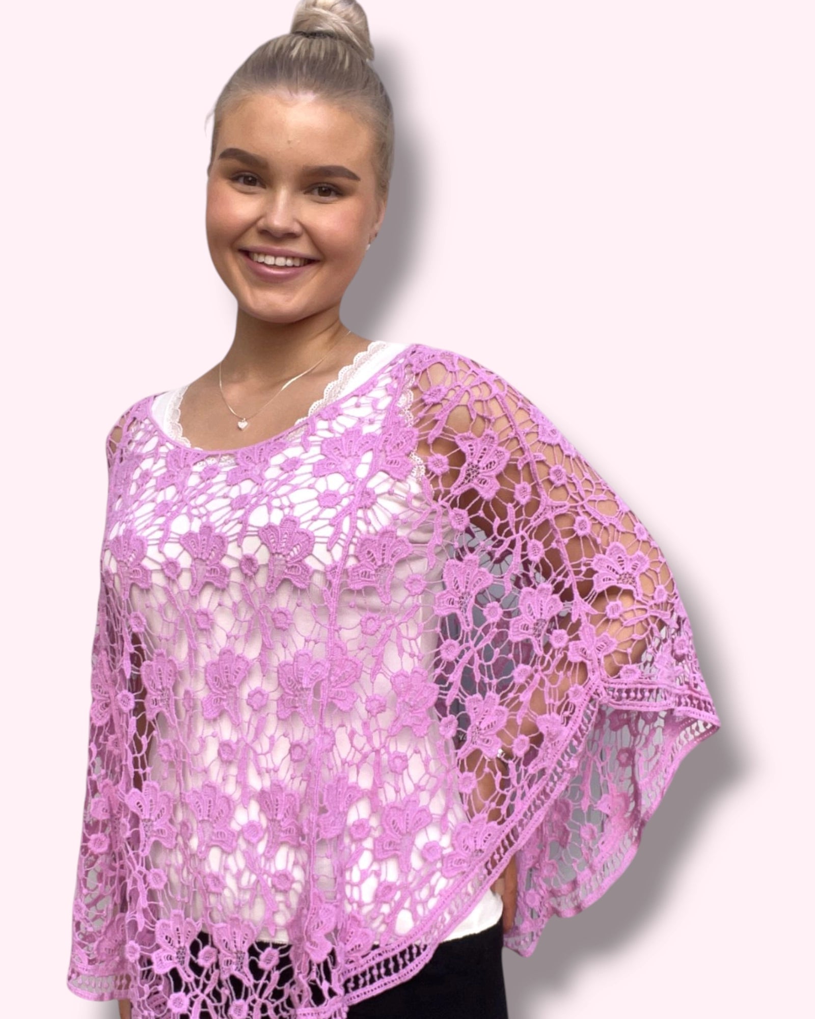 Pitsiponcho vaaleanpunainen
